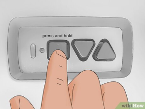 Where Is Program Reset Button On Genie Garage Door Opener