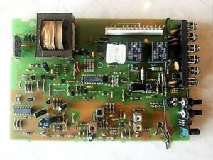 There is nothing more frustrating than pressing your remote and hearing your garage door do absolutely nothing. If you have diagnosed a faulty Genie Garage Door Opener Circuit Board 34514R, you are likely stuck with an open or unresponsive door right now. Don't worry; we are here to help you safely troubleshoot and replace this vital component so you can secure your home and get back to your day. Signs Your Genie Garage Door Opener Circuit Board 34514R is Failing Before you rush to buy a replacement part, you need to be absolutely sure the logic board is the culprit. The Genie Garage Door Opener Circuit Board 34514R acts as the brain of your opener, processing signals from your remotes, wall console, and safety sensors. When this brain starts to fail, it usually exhibits a few very specific symptoms. Here is what you should look for: Total Silence: You press the wall button or remote, and the opener does not click, hum, or light up. Partial Movement: The door starts to move, travels exactly a few inches, and then immediately reverses or stops entirely. Accessory Failure: The main motor works, but the overhead lights or the Safe-T-Beam sensor system refuses to engage. Remote Syncing Issues: You try to program a new remote, but the "Learn" button on the motor head does not respond or blink. Expert Tip: Always rule out the simple things first. Check your wall outlet for a tripped GFCI breaker, inspect the safety sensors for dirt or misalignment, and test your remote control batteries. If all of those check out, the logic board is your primary suspect. What Genie Models Are Compatible with the 34514R Board? Not every Genie opener uses the same internal components. The Genie Garage Door Opener Circuit Board 34514R (often sold as the 34514R.S replacement kit) is specifically engineered for Genie’s high-speed screw-drive and DC motor systems. Below is a quick-reference table to help you verify if this board is the correct part for your specific garage door opener model. Genie Model Family Specific Model Numbers Motor Type Excelerator ISD900, ISD950, ISD1000, ISD1200 DC Motor / Screw Drive MachForce IMT1000, GXL9000 DC Motor TriloG 1060, 1560 (Select Years) Belt / Chain DC Motor Note: Always check the serial number and manufacturing date on your motor head's rating label. Manufacturers occasionally update internal schematics, meaning a board for a 2008 Excelerator might slightly differ from one made in 2012. Why Do Garage Door Logic Boards Fail? Understanding why these boards fail can help you prevent future breakdowns. According to Wikipedia's comprehensive overview of garage door openers, modern openers rely heavily on intricate printed circuit boards (PCBs) to manage complex soft-start and soft-stop mechanisms. Because the logic board is connected directly to your home's electrical grid and a heavy-duty motor, it takes a lot of abuse. Here are the top three reasons your board likely died: Power Surges and Lightning: This is the number one killer of logic boards. Even a minor electrical spike from a neighborhood transformer can fry the microchips. Industry repair data shows that over 45% of premature logic board failures are directly linked to unmitigated power surges. Heat and Vibration: The Excelerator and MachForce models operate at very high speeds. Over years of use, the constant vibration can crack the microscopic solder joints on the circuit board. Worn Out Relays: The small black cubes on the board (relays) physically click every time the door moves. After 10,000 to 15,000 cycles, the internal contacts simply burn out. Advanced Troubleshooting: Testing the Board with a Multimeter If you want to be 100% certain before ordering your Genie Garage Door Opener Circuit Board 34514R, you can test it using a standard digital multimeter. This step separates the DIY novices from the pros. Tools needed: A digital multimeter and basic safety gloves. Safety First: Ensure the opener is plugged in but the door is in the fully closed position. Test Sensor Voltage: Set your multimeter to DC Voltage (20V setting). Place the probes on the sensor terminals on the back of the logic board. You should read exactly 5.0V to 6.0V DC. If you read 0V, the board's internal transformer is dead. Test the Wall Console: Set your meter to AC Voltage. Probe the wall button terminals while an assistant presses the button. You should see a fluctuation in voltage. No fluctuation means the board is not sending the signal. Step-by-Step Guide to Replacing the Genie Garage Door Opener Circuit Board 34514R Replacing the board is a highly manageable DIY project. You do not need to touch the heavy torsion springs or the high-tension cables. You only need to work with the low-voltage electronics. Follow these exact steps for a safe and successful installation: Step 1: Disconnect the Power and Discharge Capacitors Unplug the 120V AC power cord from the ceiling outlet. Wait exactly 5 minutes. This allows the high-voltage capacitors inside the motor head to safely discharge, protecting you from a dangerous shock. Step 2: Remove the Motor Cover Use a Phillips #2 screwdriver or a 5/16-inch nut driver to remove the screws holding the plastic light lens and the main motor cover. Gently lift the cover off to expose the metal chassis. Step 3: Disconnect the Wiring Harnesses Before unscrewing the board, you must unplug the wires connecting it to the machine. Disconnect the 3-wire wall console harness. Disconnect the 2-wire Safe-T-Beam sensor harness. Carefully detach the antenna wire (usually a thin purple or black wire). Step 4: Swap the Circuit Board Remove the 4 to 6 mounting screws securing the old logic board to the metal chassis. Lift the old board out. Place your new Genie Garage Door Opener Circuit Board 34514R into the chassis and secure it with the mounting screws. Do not overtighten, as the board is made of fragile fiberglass. Step 5: Reconnect and Test Plug all the wiring harnesses back into their designated color-coded slots. Reattach the antenna wire. Plug the 120V AC power back in. Press the wall button to test the travel limits. DIY Replacement vs. Hiring a Professional Still on the fence about doing this yourself? Here is a quick text infographic to help you weigh your options: DIY Replacement (Pros): Cost-Effective: You only pay for the part (typically $60 to $90). Time-Saving: Takes about 30 to 45 minutes from start to finish. Educational: You learn the inner workings of your home's security systems. Hiring a Pro (Cons): High Cost: Expect to pay $250 to $350 when factoring in the service call fee and markup on parts. Scheduling Delays: You might have to wait 24 to 48 hours for an available technician, leaving your garage insecure overnight. Verdict: Unless you are highly uncomfortable working near any electrical components, replacing the logic board is a highly recommended DIY task. Frequently Asked Questions (FAQ) 1. Can a power surge damage the Genie Garage Door Opener Circuit Board 34514R? Yes, absolutely. Power surges from lightning storms or utility grid switching are the leading cause of logic board failure. We highly recommend installing a dedicated surge protector for your garage door opener outlet to protect your new board. 2. Do I need to reprogram my remotes after replacing the 34514R board? Yes. When you install a new circuit board, the opener's memory is wiped. You will need to locate the "Learn" button on the new board and follow the manufacturer's instructions to sync your existing remotes and wireless keypads back to the opener. 3. How long does a Genie logic board typically last? Under normal conditions, a high-quality Genie logic board will last between 7 to 10 years. However, if your garage experiences extreme temperature fluctuations or frequent power fluctuations, the lifespan can drop to 3 to 5 years. 4. What is the average cost to replace a Genie circuit board? If you do it yourself, the replacement Genie Garage Door Opener Circuit Board 34514R typically costs between $60 and $95 depending on the retailer. If you hire a professional garage door technician, expect the total bill (parts and labor) to range from $225 to $350. 5. Why is my Genie garage door opener beeping after a board replacement? A beeping sound usually indicates an error code or a low battery backup. If your model features a battery backup system, the new board may be alerting you that the backup battery needs to be replaced. Check the LED light on the motor head; a flashing red or amber light paired with a beep points to a specific sensor or battery issue outlined in your manual. Conclusion Dealing with a broken garage door is a major hassle, but diagnosing and fixing the issue doesn't have to be a nightmare. By understanding the symptoms, verifying your model's compatibility, and following our detailed installation steps, you can easily install a new Genie Garage Door Opener Circuit Board 34514R and restore your home's security in under an hour. You save money, you learn a valuable home maintenance skill, and you get the satisfaction of fixing it yourself. Genie Garage Door Opener Circuit Board 34514R